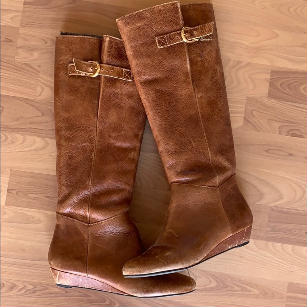 Tall brown leather boots